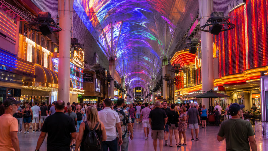 Visitors walking between casinos on Fremont Street in downtown Las Vegas
