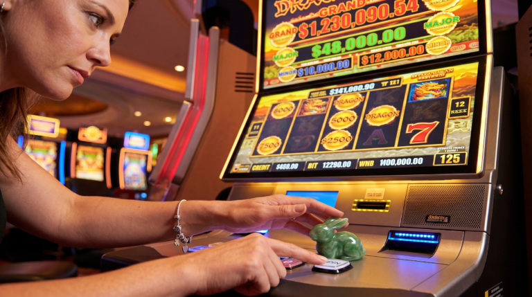 Player sitting at a Golden Century slot machine illustrating how RNG determines every spin outcome independently.